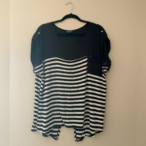 B&W striped top, sheer top panel and winged open back, pocket front